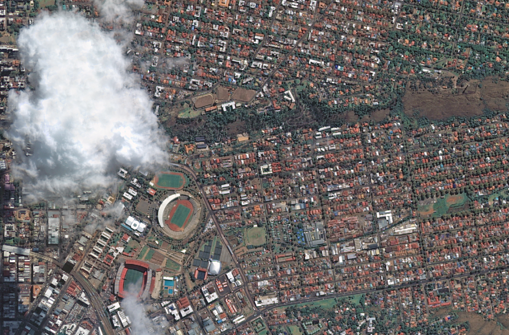 A section of central Johannesburg, South Africa’s biggest city with the Ellis Park Rugby Stadium and Standard Bank Arena shown next to the patch of cloud cover. The high definition satellite image was taken from a height of 400 km by an Urthecast Deimos camera.
