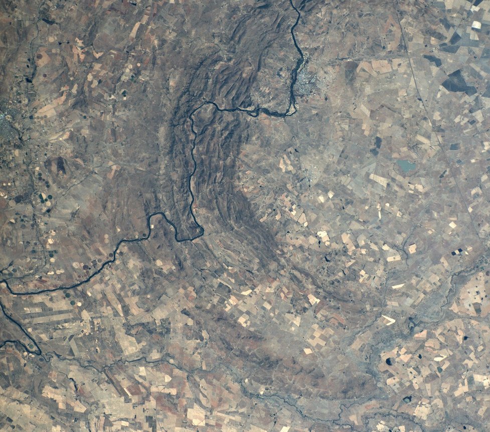 SAC - Gecko – Vredefort A photo taken by the Space Advisory Service Gecko Imager on board their nSight-1 Satellite from a height of 400km. This image depicts part of the Orange River and Vredefort Dome in South Africa which is the largest verified impact crater on Earth, some 190 kilometers across and also a UNESCO World Heritage Site.